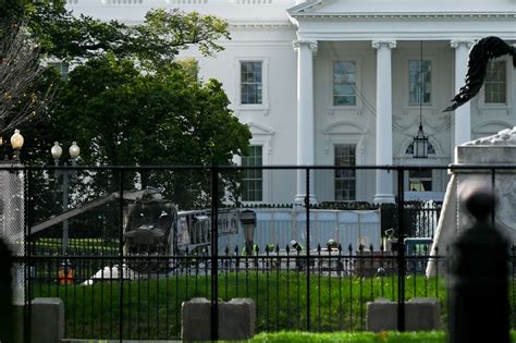 metal scaffolding around white house|Fencing erected at White House, Harris' residence ahead of.